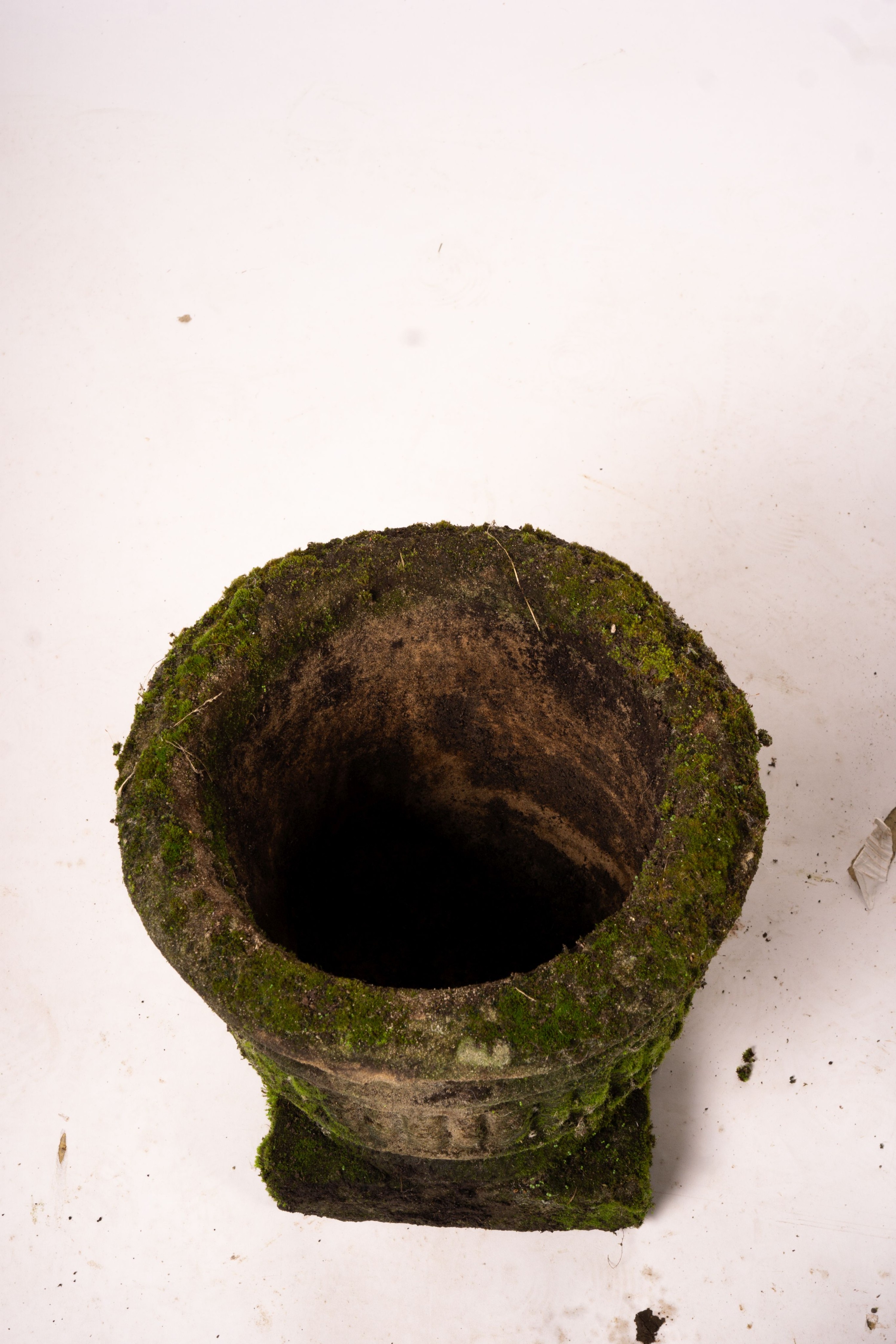 Three weathered reconstituted stone circular garden planters, largest Diam.52cm H.34cm